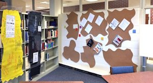Corner in the library with one wall used as a bulletin board