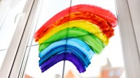 A rainbow painted on a house window during coronavirus quarantine