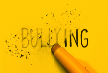 Graphic of a pencil eraser rubbing out the word "bullying."