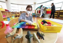Teachers disinfect toys at Hanil Kindergarten in Suwon, South Korea, 26 May 2020. Millions of students throughout South Korea are expected to return to school on 27 May as the country gradually lifts coronavirus restrictions. 
