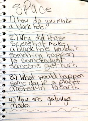 A notebook entry entitled Space with the following questions: 1) how do you make a black hole. 2) Why did those sciecetist make a black hole wouldn't something happen to somebody or someone get hurt. 3) What would happen some day if a planet crashed in to