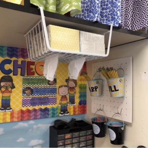 A teacher's classroom hack with under shelf storage for tissue boxes