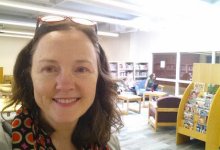 photo of a teacher-librarian in the library