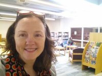 photo of a teacher-librarian in the library