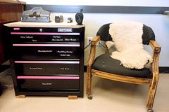 A large tool cabinet next to a chair