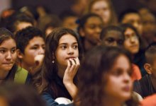 Close-up of students listening