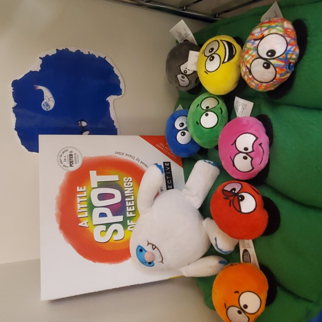 Photo of book and stuffed animals