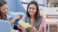 High school students study with flash cards