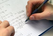Photo of student doing math in notebook