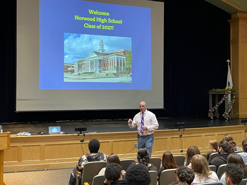 Principal Hugh Galligan leading a school assembly