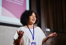 Photo of teacher speaking at conference