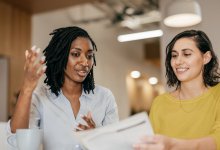 Photo of two teachers in a meeting