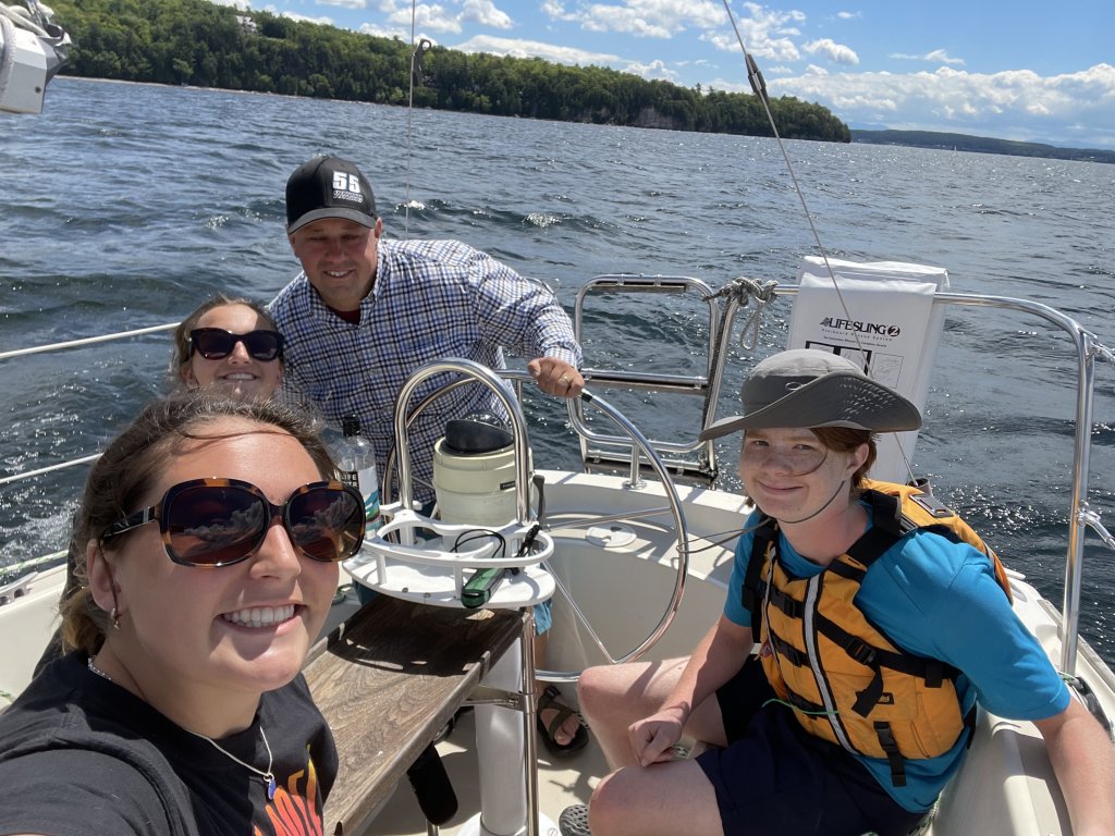 David Schilling on a boat with others