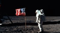Photo of Buzz Aldrin and the U.S. flag on the moon. Apollo 11 Moon Landing.