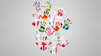 Handprints made of world flags