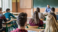 assigned seating at school Photo of high school teacher and students in classroom
