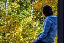Photo of teen looking at nature