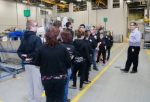 Students touring a factory