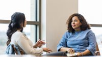 Photo of two teachers talking