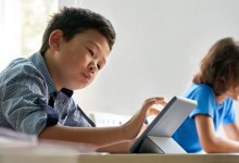 Elementary student using a tablet
