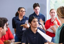 Teacher working with a group of students