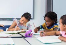 Photo of elementary students writing