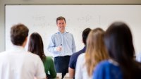 Math teacher leading class in discussion