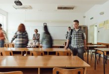 Photo of high school students entering classroom