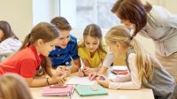 Photo of elementary students working as a group