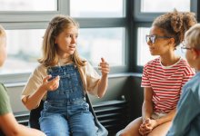 Elementary students in a small group discussion