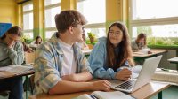 Two students talking in class