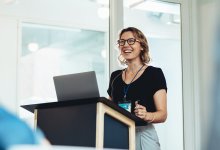 Woman speaking at a conference