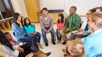 Group of parents and students talking