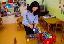 Teaching putting up toys in the classroom