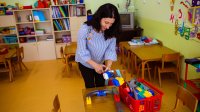 Teaching putting up toys in the classroom