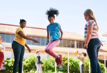 Photo of middle school students jumping rope at recess