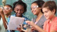 Elementary students working together in science class