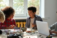 Photo of middle school students doing robotics