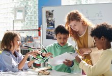 Photo of elementary students working together on a project