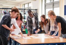 Photo of high school students working together