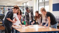 Photo of high school students working together