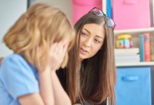 Teacher consoling student