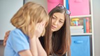 Teacher consoling student