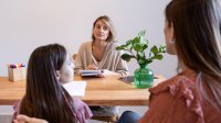 Meeting between parent, student and teacher