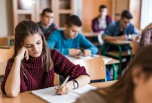 Photo of high school students writing in class