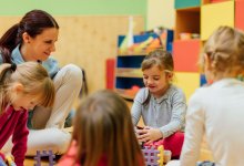 Photo of elementary school teacher and students