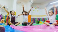 Young students practicing yoga