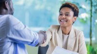 People shaking hands during a job interview