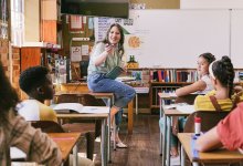 Teacher talking to students