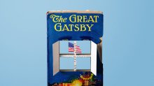 photo of The Great Gatsby with a window cut through the center, revealing an American flag